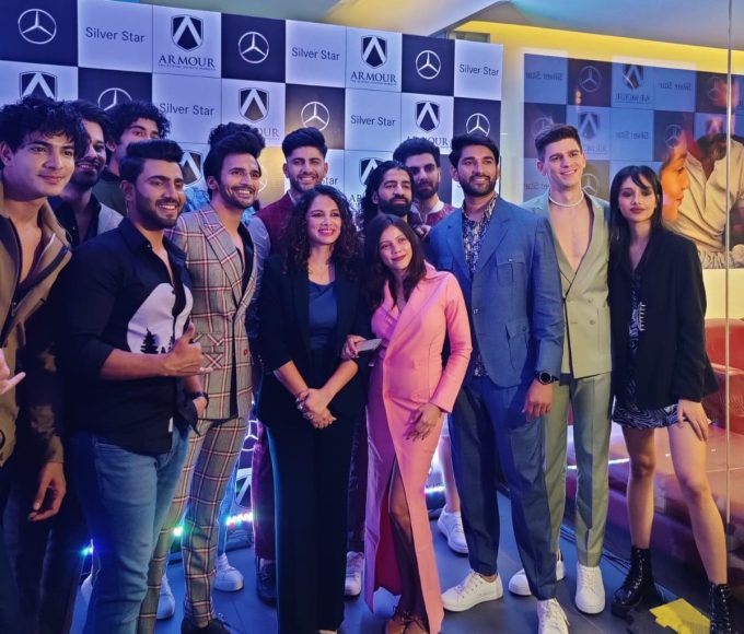 Founder-Pranita Salunkhe with the showstopper Bhushan Pradhan and the team at the launch of‘Luxury In Motion’ collection by Armour Bespoke, in collaboration with Silver Star